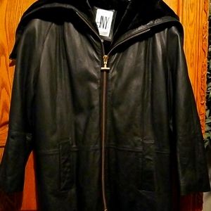 Black leather, unique zipper hood, fur accented Jones New York  coat, size Med